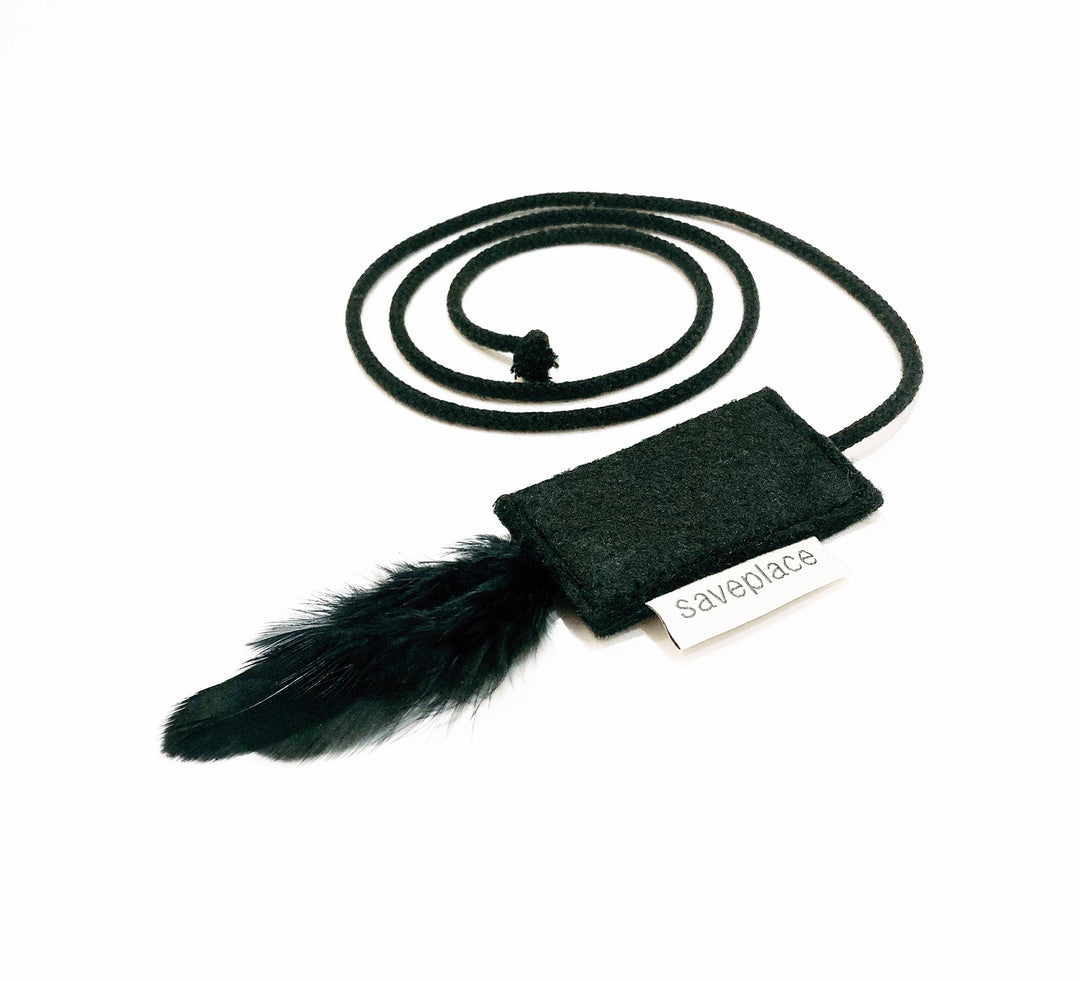 NIGHTSaveplace® black artificial wool cat toy with feathers